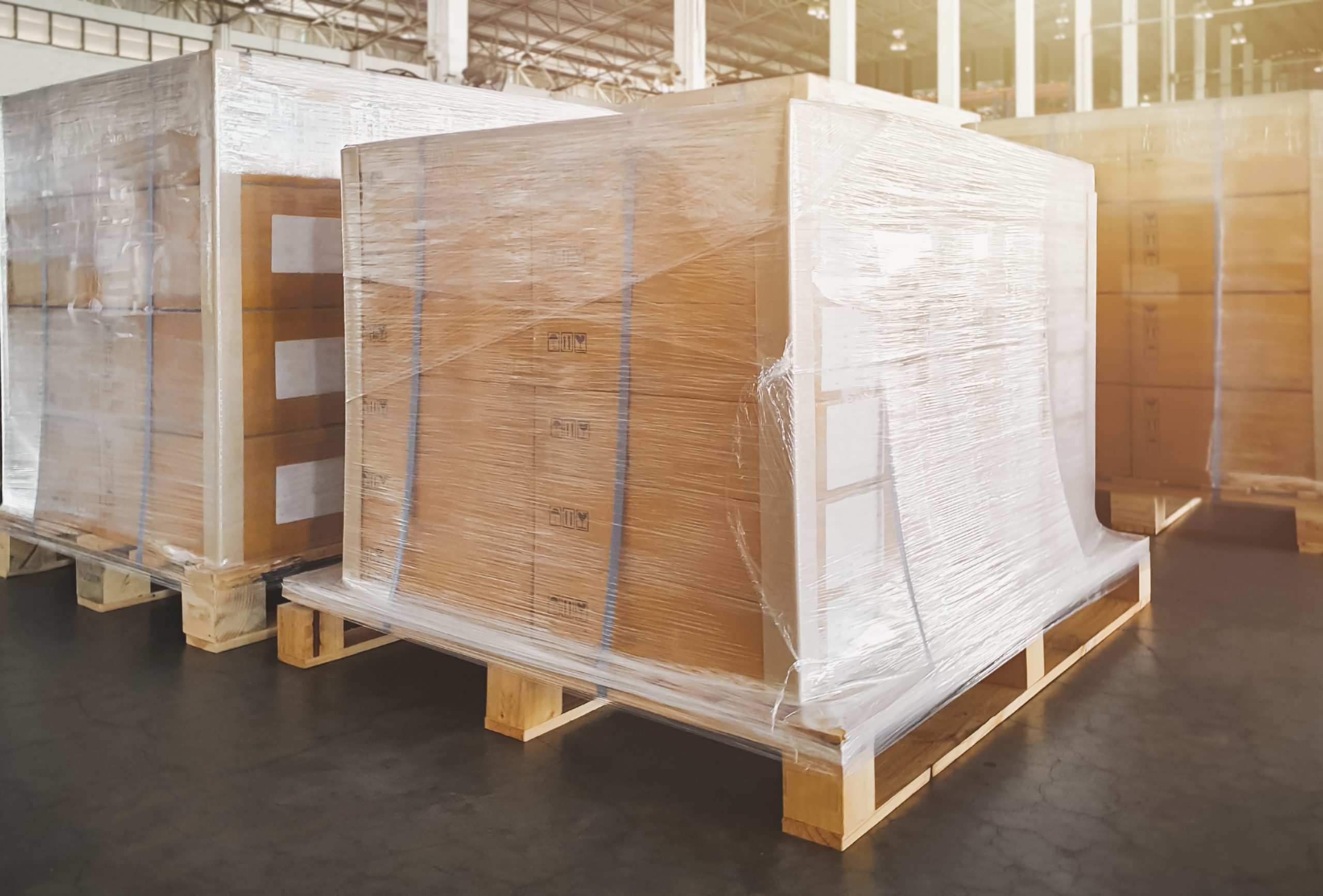 packaging-boxes-wrapped-plastic-film-pallets-storage-warehouse-supply-chain-shipping-warehouse